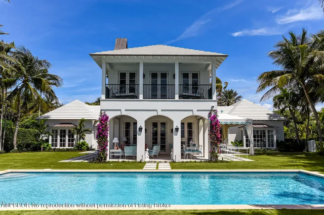 a view of a house with a swimming pool