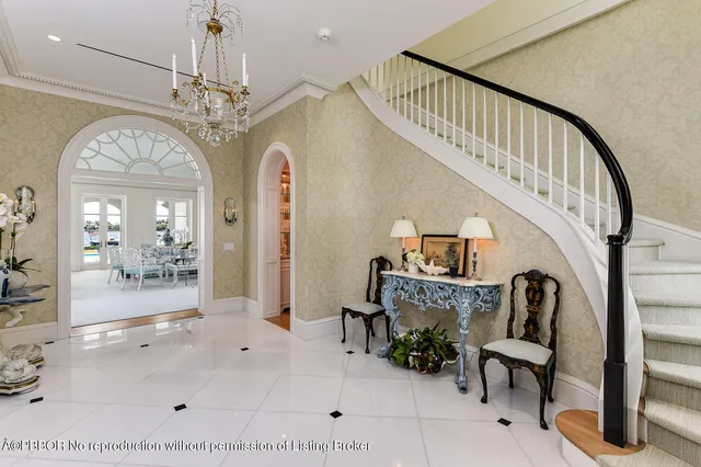 a view of hall way with furniture