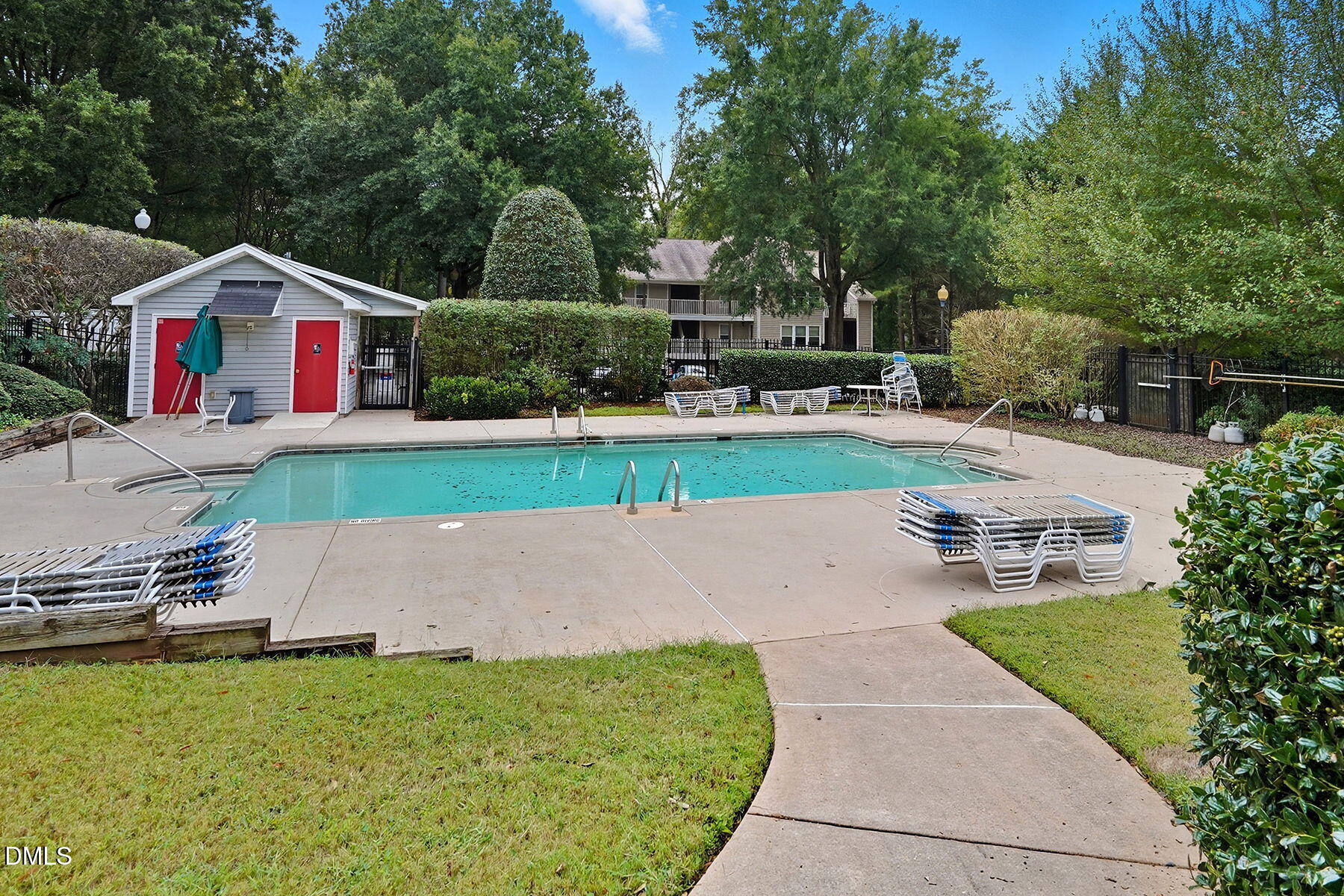 1308 Hillbrow Lane, Unit 203 Raleigh, NC 27615 - Photo 26 of 27 a aerial view of a house with swimming pool and yard