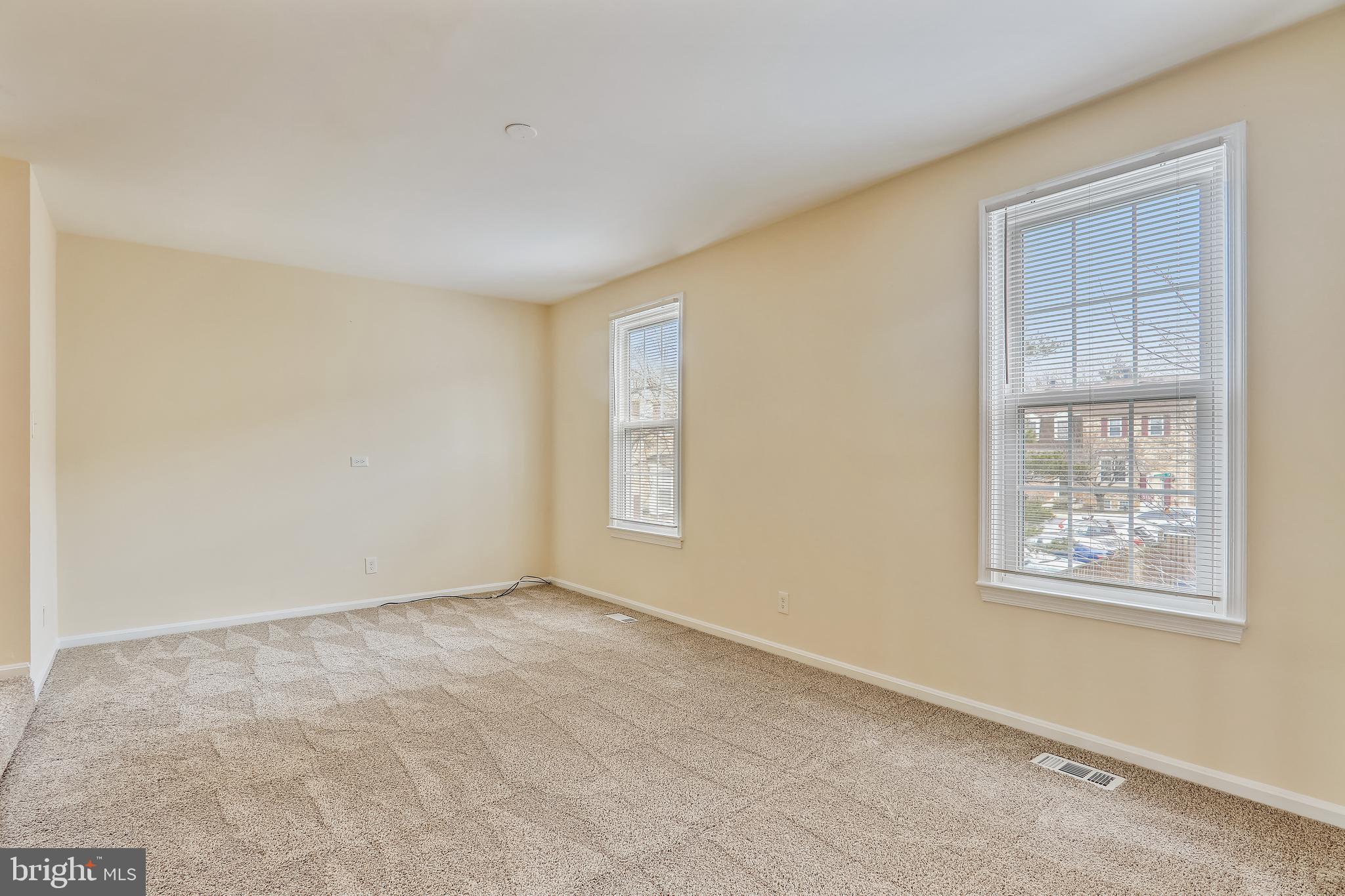 10600 Georgia Avenue Silver Spring, MD 20902 - Photo 13 of 44 Main level step-down living room