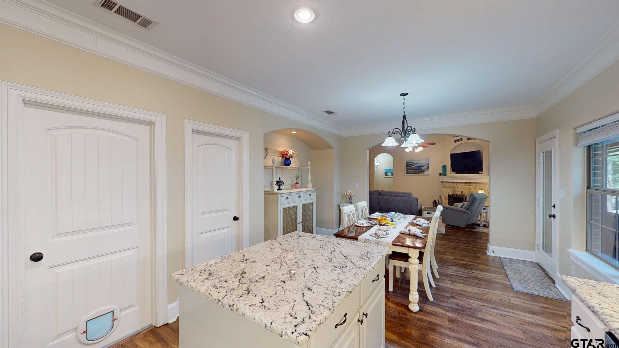 18488 Bluebird Circle Flint, TX 75762 - Photo 13 of 47 a view of a dining room with furniture and wooden floor
