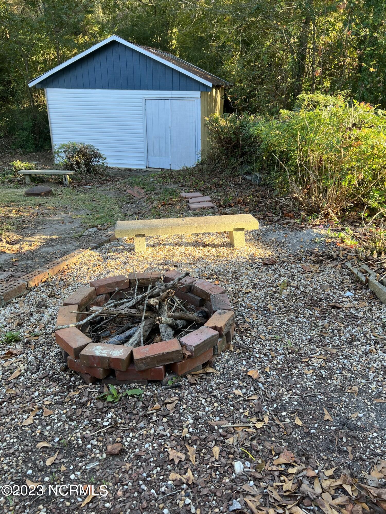 1490 Kellum Loop Road Jacksonville, NC 28546 - Photo 27 of 38 Firepit & Workshop
