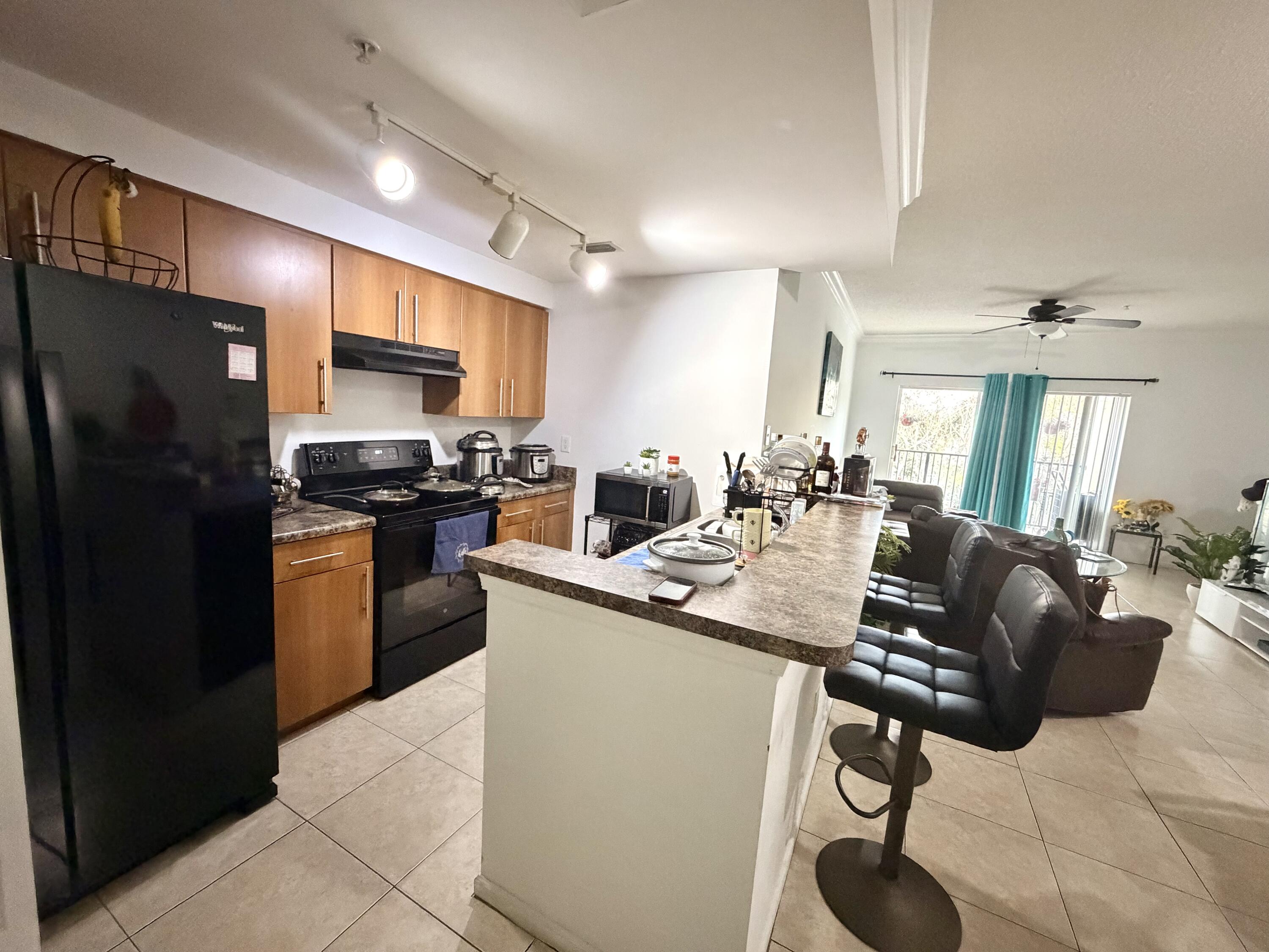 6020 West Sample Road, Unit 303 Coral Springs, FL 33067 - Photo 6 of 17 IMG_4893