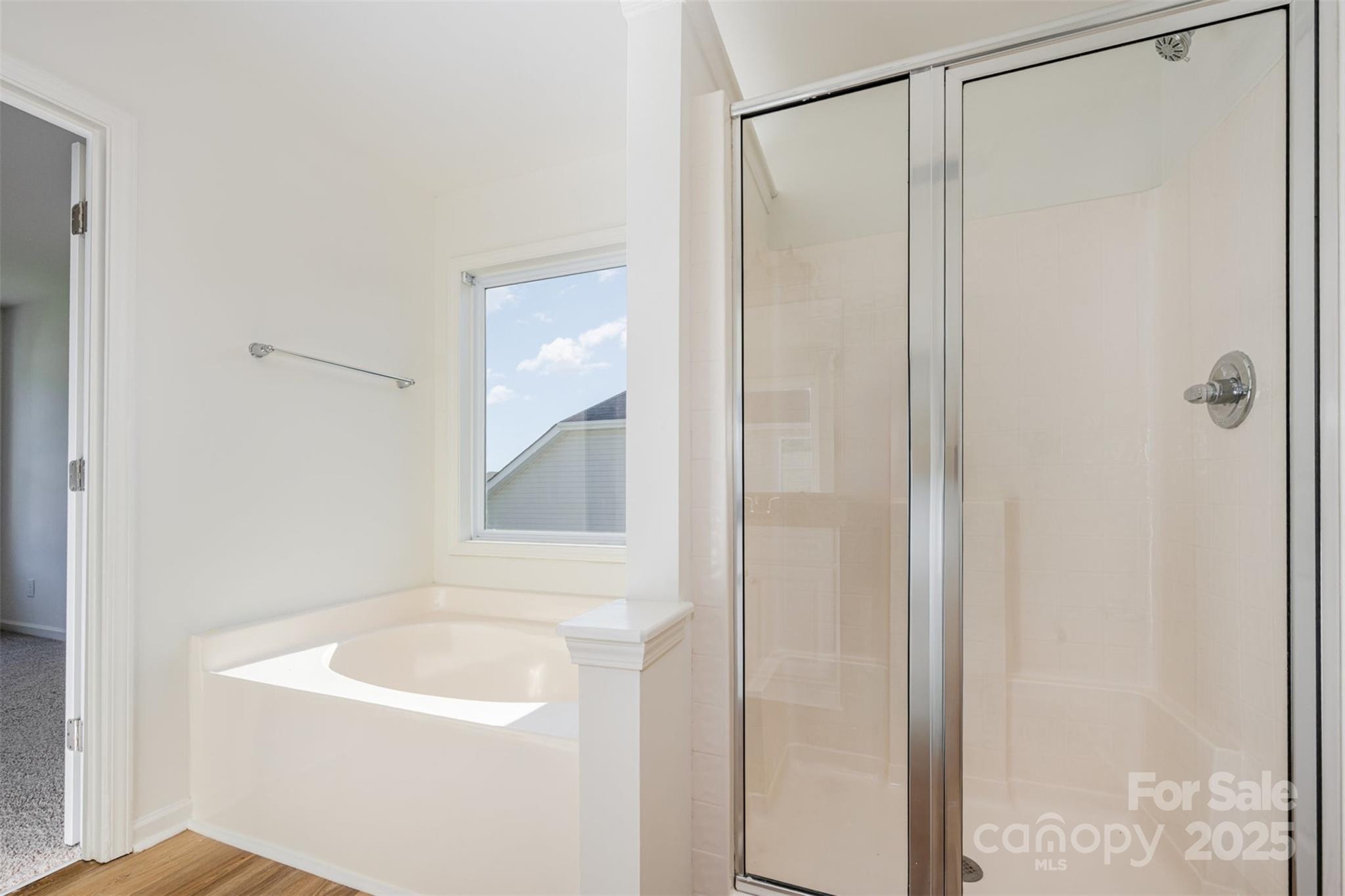 2206 Kingstree Drive Monroe, NC 28112 - Photo 13 of 25 a bathroom with a shower and a sink