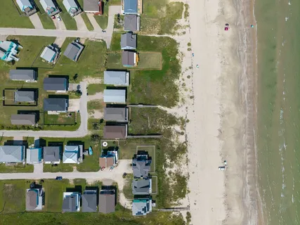 a view of a city with lawn chairs