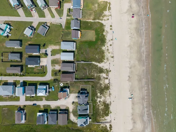 a view of a city with lawn chairs
