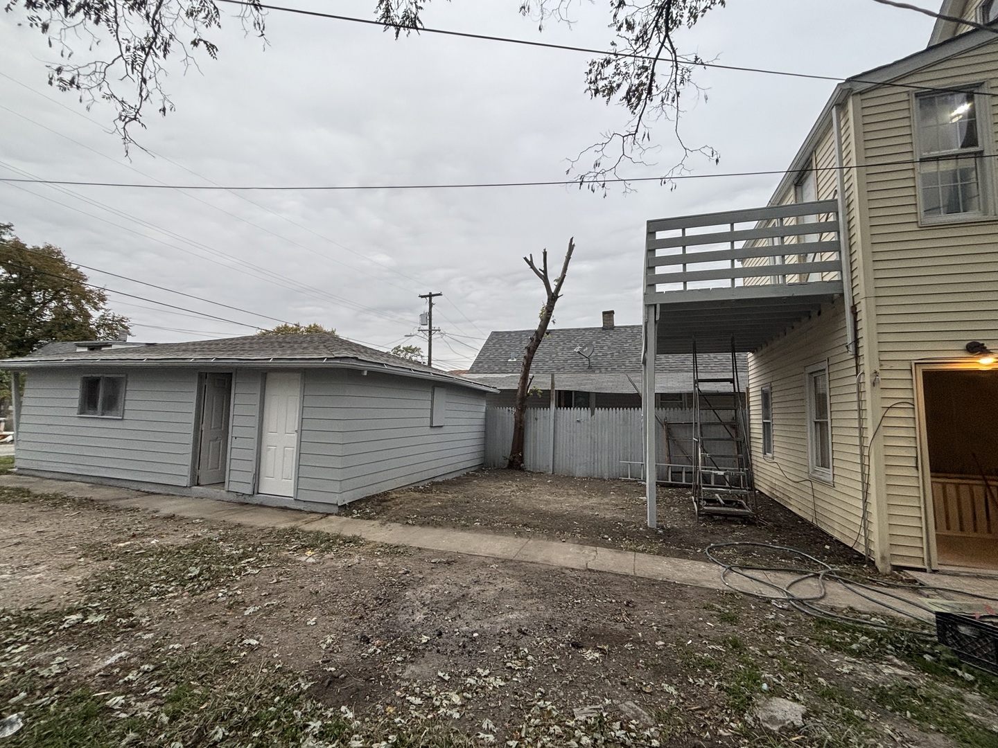 15634 Union Avenue Harvey, IL 60426 - Photo 34 of 34 a view of a house with a garage