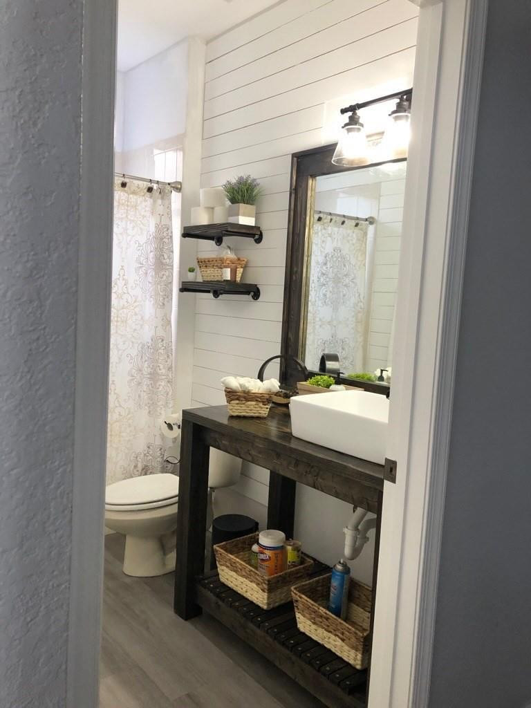 5633 Spanish River Road Fort Pierce, FL 34951 - Photo 7 of 46 1st floor bathroom #1
