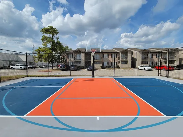 an outdoor space with pool and furniture