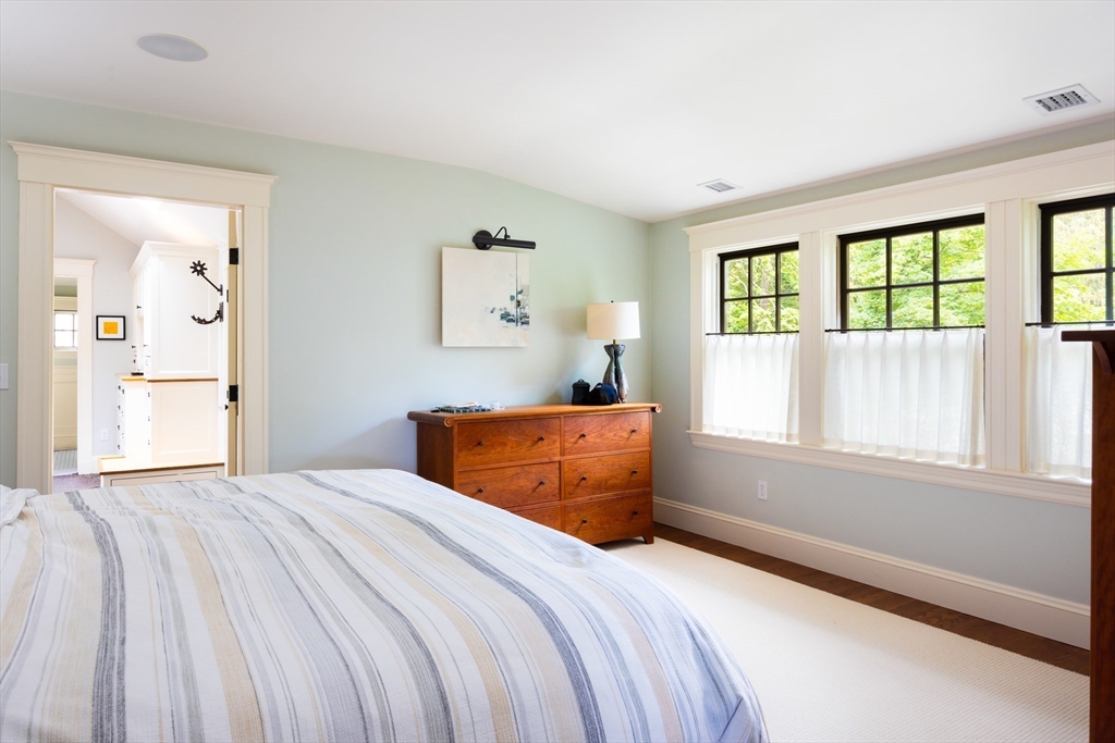 87 Greenough Street, Unit 2 Brookline, MA 02445 - Photo 11 of 23 a bedroom with a bed and a window