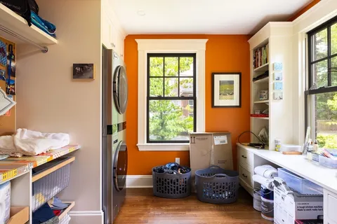 a bed room with a bed and a window