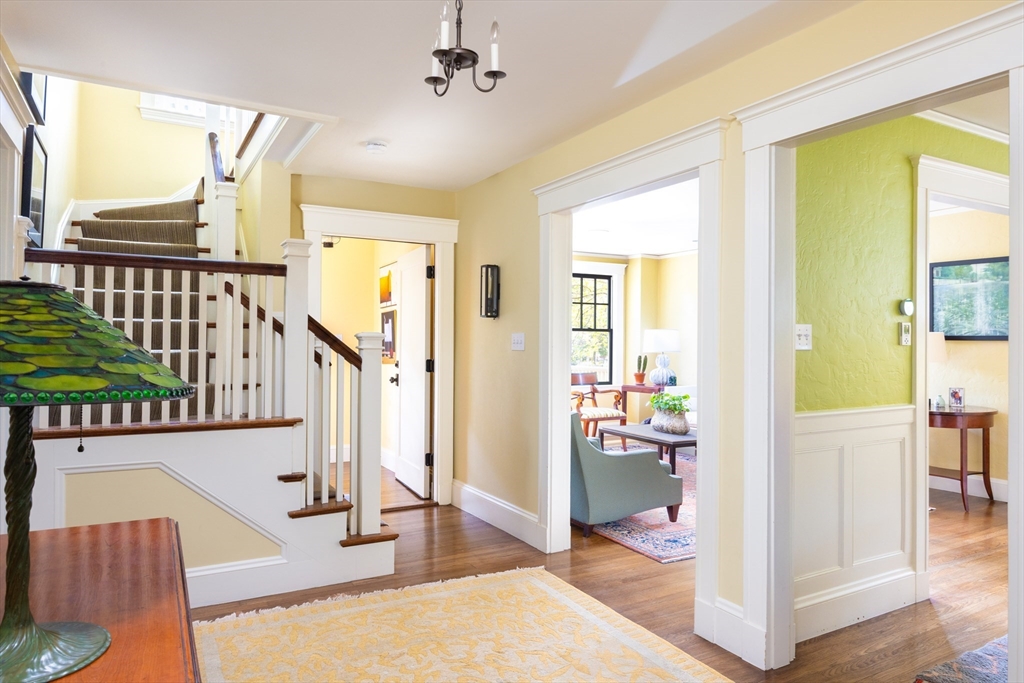 87 Greenough Street, Unit 2 Brookline, MA 02445 - Photo 2 of 23 a view of an entryway with wooden floor and a livingroom