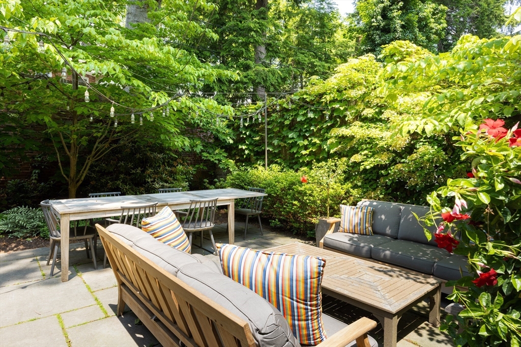 87 Greenough Street, Unit 2 Brookline, MA 02445 - Photo 22 of 23 a view of backyard with deck and outdoor seating