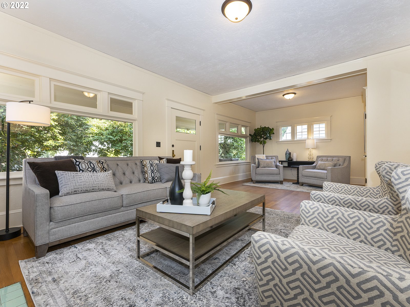 2424 Southeast Caruthers Street Portland, OR 97214 - Photo 5 of 32 a living room with furniture and a large window