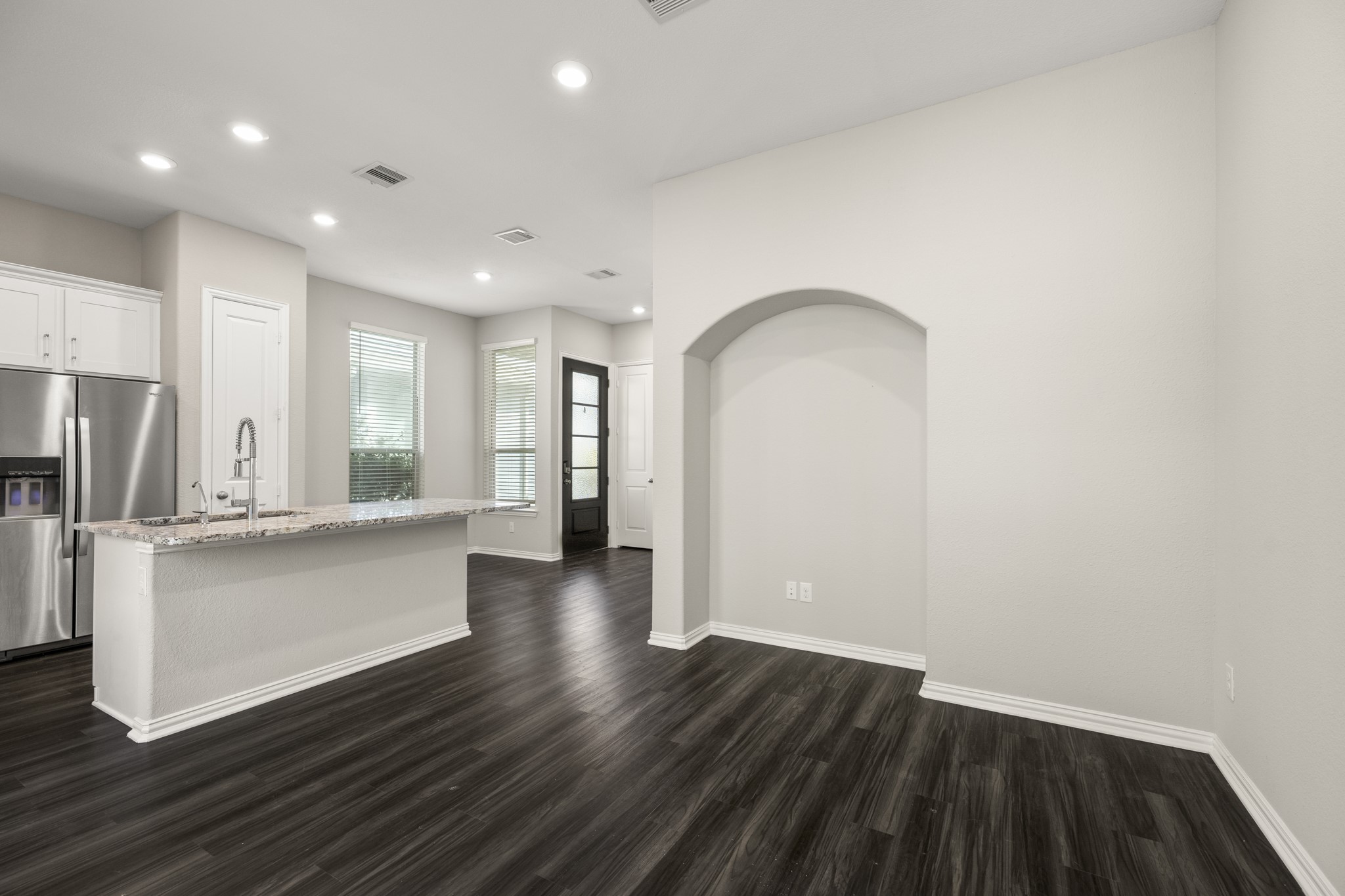 162 Moon Dance Court Conroe, TX 77304 - Photo 12 of 36 a view of kitchen with sink and refrigerator
