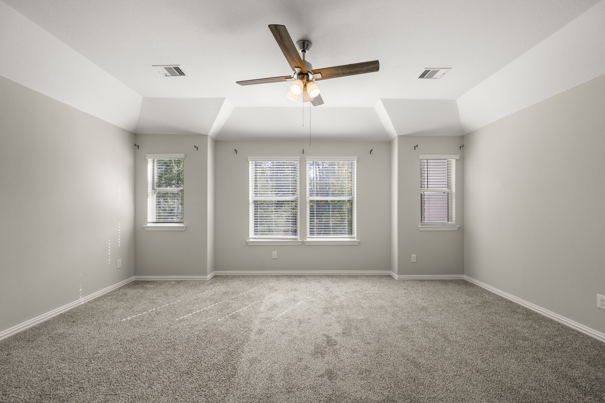 162 Moon Dance Court Conroe, TX 77304 - Photo 16 of 36 a view of an empty room with a window
