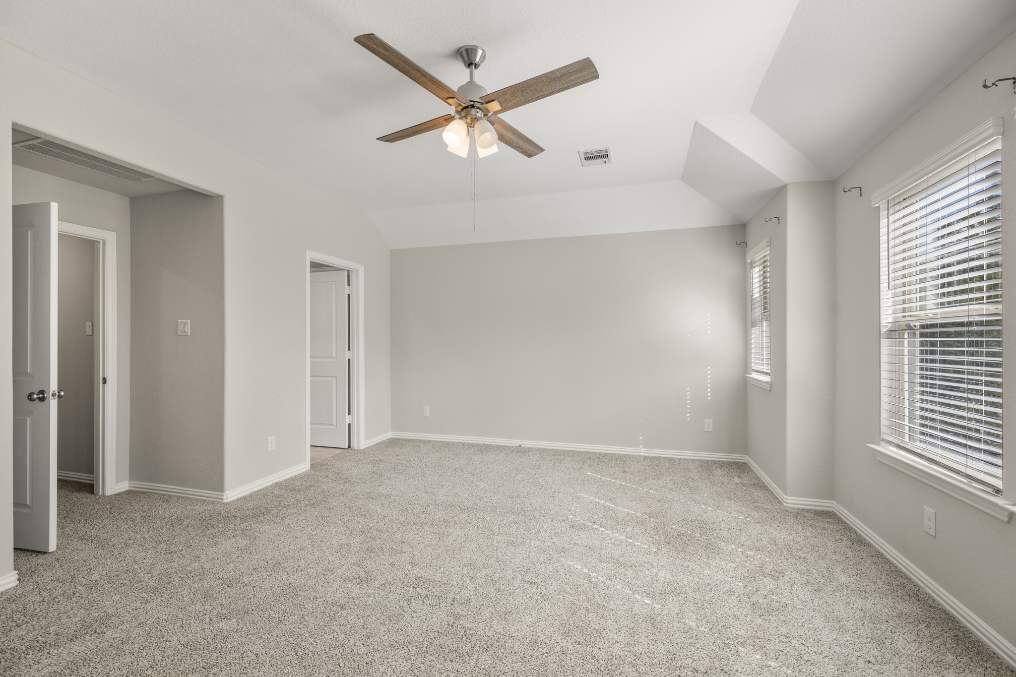 162 Moon Dance Court Conroe, TX 77304 - Photo 17 of 36 a view of an empty room with a window