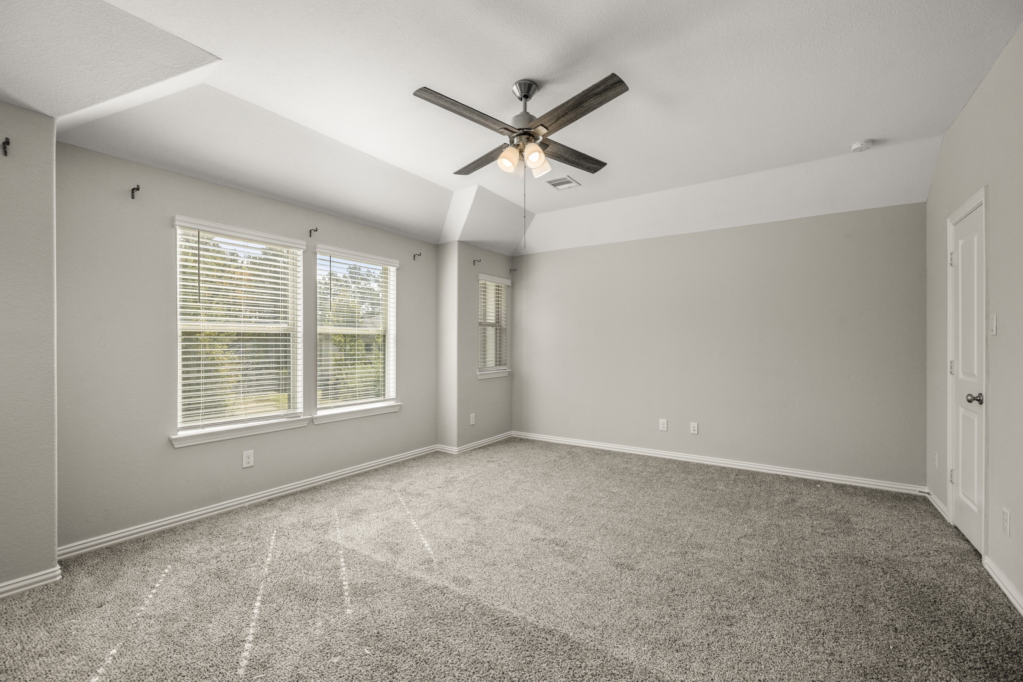 162 Moon Dance Court Conroe, TX 77304 - Photo 18 of 36 a view of an empty room with a window