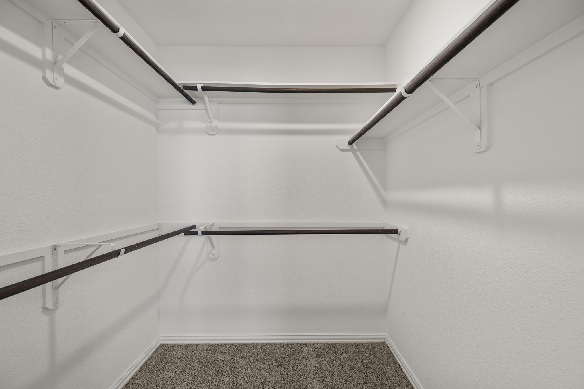 162 Moon Dance Court Conroe, TX 77304 - Photo 23 of 36 a view of walk in closet