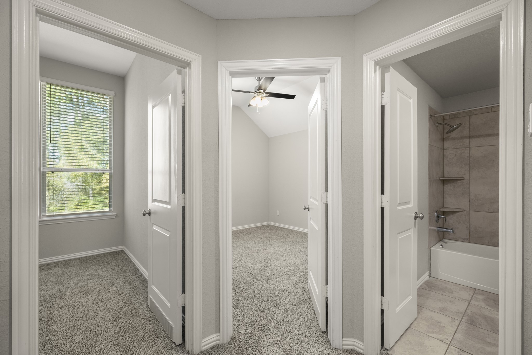 162 Moon Dance Court Conroe, TX 77304 - Photo 24 of 36 a view of a bathroom with a glass door shower