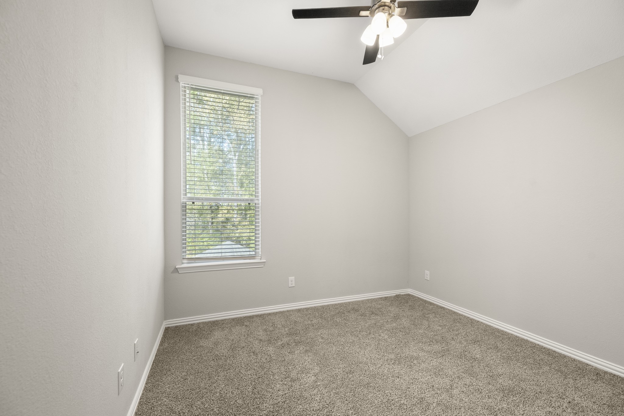 162 Moon Dance Court Conroe, TX 77304 - Photo 26 of 36 an empty room with a window