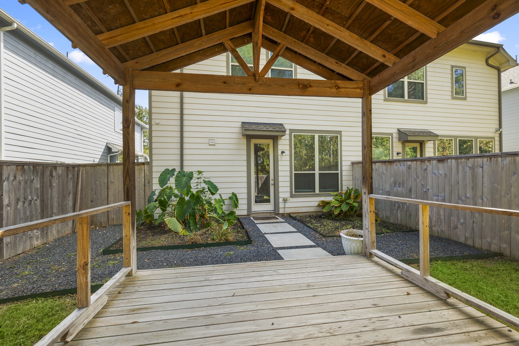 162 Moon Dance Court Conroe, TX 77304 - Photo 31 of 36 a front view of a house with garden