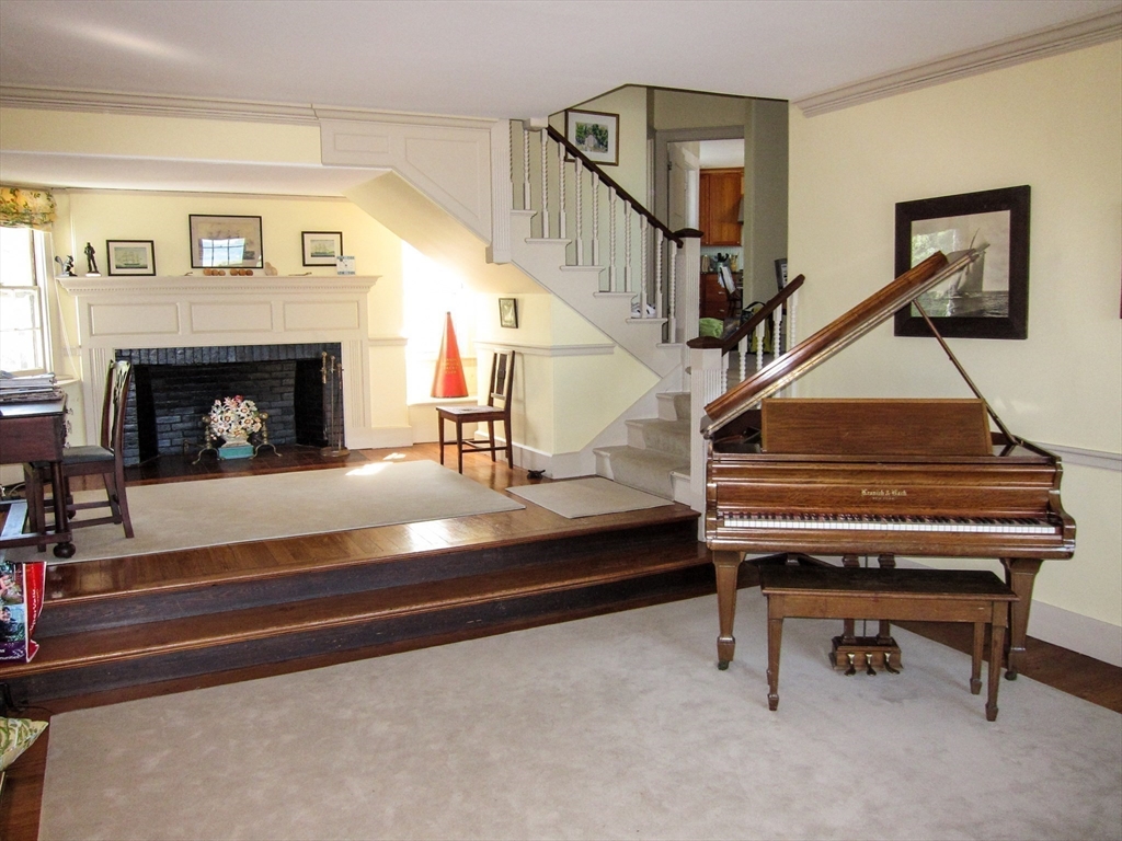 48 Proctor Street Manchester, MA 01944 - Photo 26 of 39 a living room with a fireplace