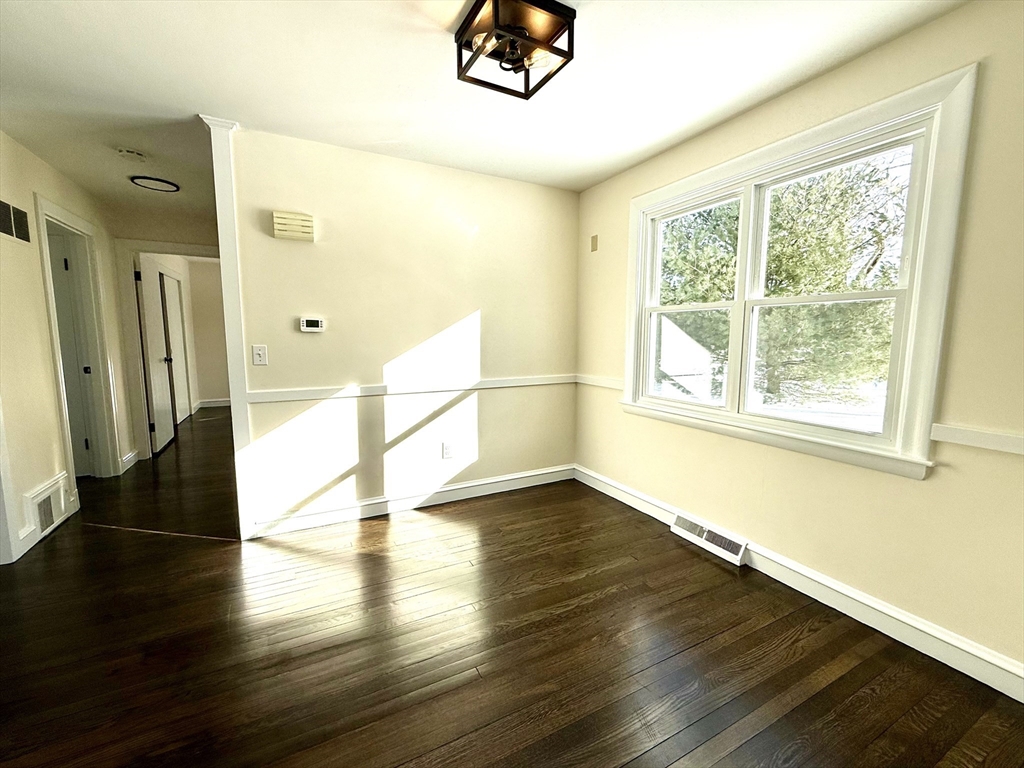 30 Alroy Road Weymouth, MA 02190 - Photo 13 of 40 a view of a room with wooden floor and a window