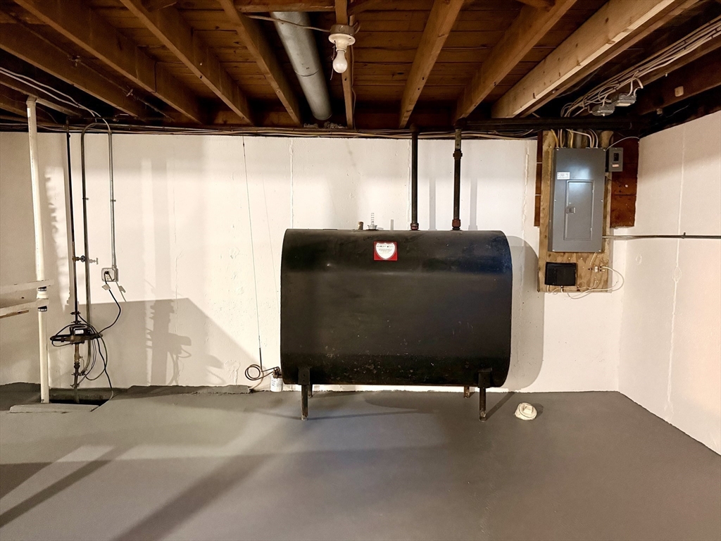 30 Alroy Road Weymouth, MA 02190 - Photo 31 of 40 a bed sitting in a room next to a window