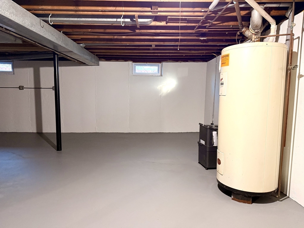 30 Alroy Road Weymouth, MA 02190 - Photo 32 of 40 a view of a storage & utility room with two washing machine