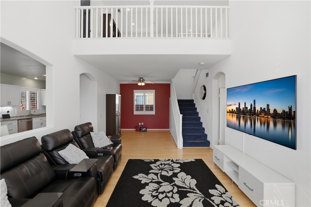 16123 Setting Sun Circle Riverside, CA 92503 - Photo 17 of 67 a living room with furniture and a fireplace