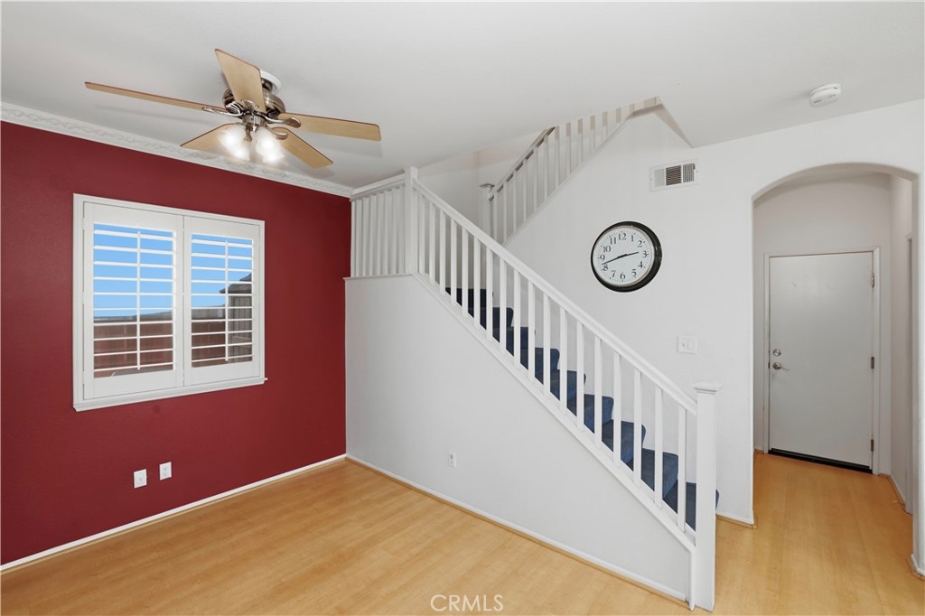 16123 Setting Sun Circle Riverside, CA 92503 - Photo 19 of 67 a view of a livingroom with a hardwood floor