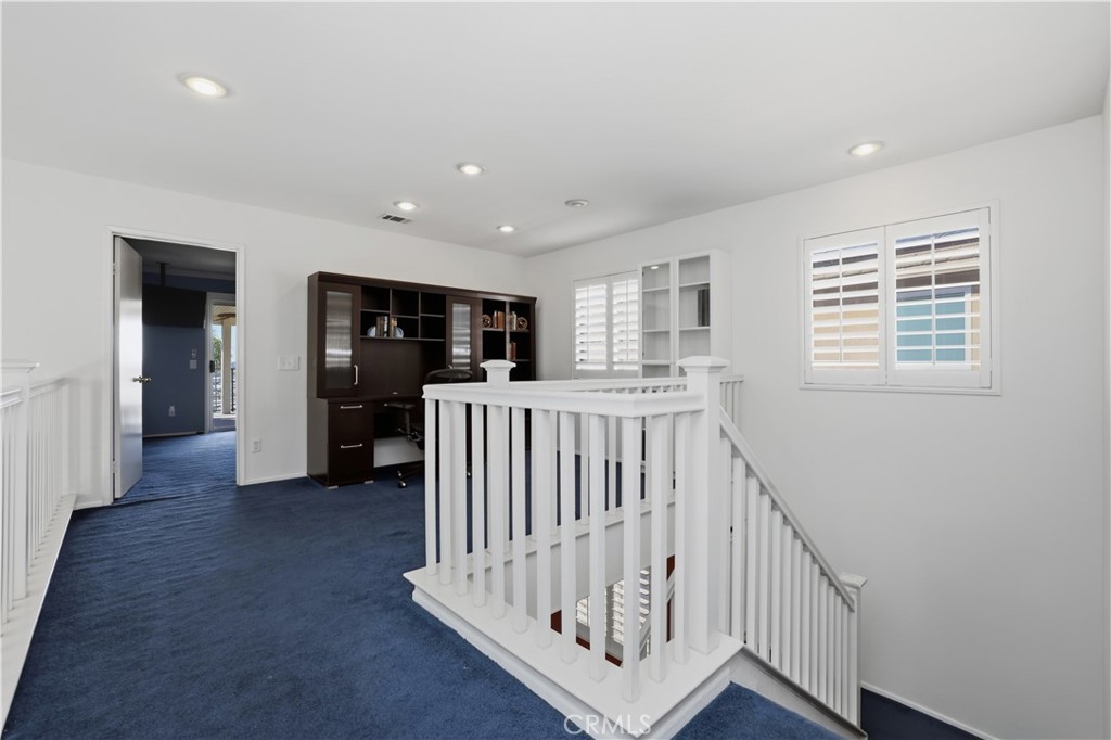 16123 Setting Sun Circle Riverside, CA 92503 - Photo 26 of 67 a view of entryway with wooden floor and windows