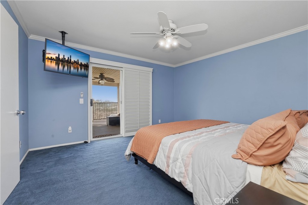 16123 Setting Sun Circle Riverside, CA 92503 - Photo 33 of 67 a bed room with a bed and a chair