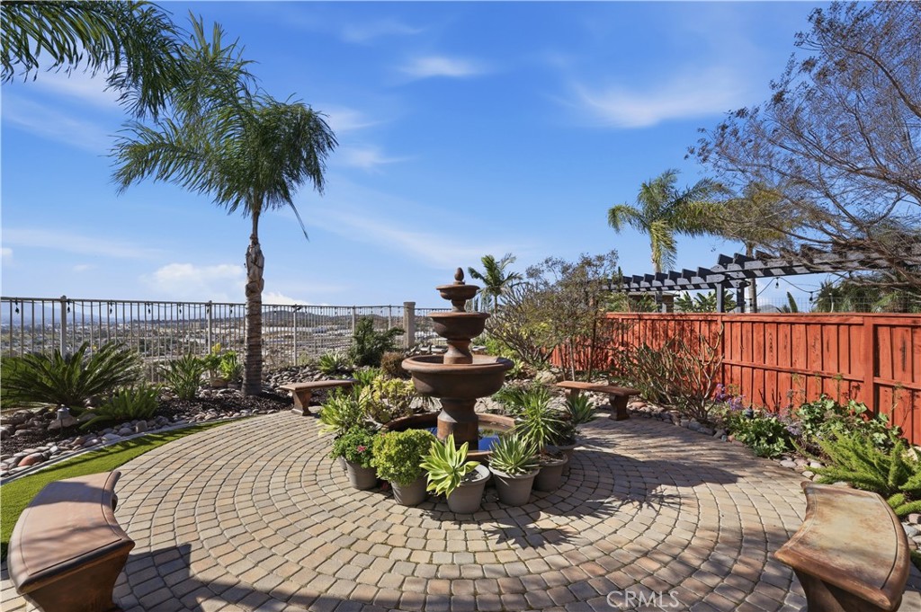 16123 Setting Sun Circle Riverside, CA 92503 - Photo 45 of 67 a view of a garden with sitting area