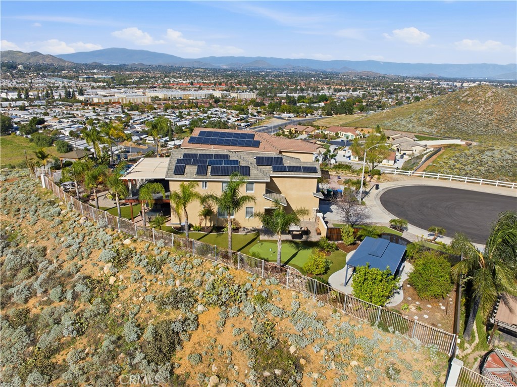16123 Setting Sun Circle Riverside, CA 92503 - Photo 53 of 67 an aerial view of residential houses with outdoor space and ocean view