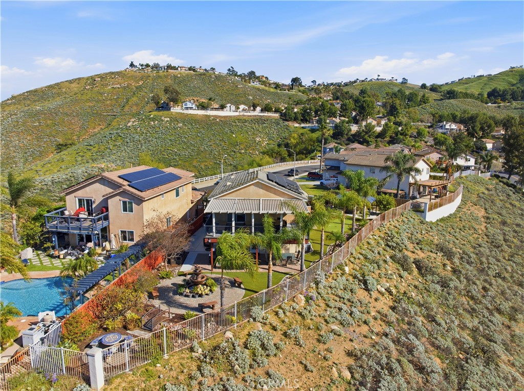 16123 Setting Sun Circle Riverside, CA 92503 - Photo 54 of 67 a view of a lake with a garden