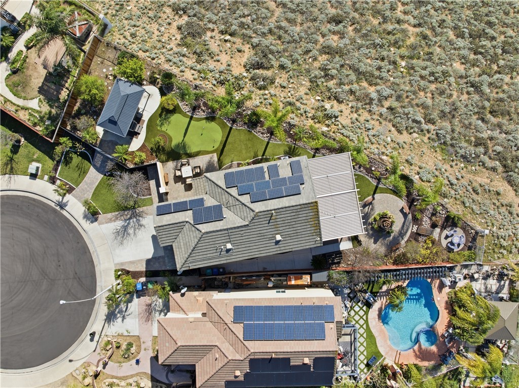16123 Setting Sun Circle Riverside, CA 92503 - Photo 55 of 67 an aerial view of a house with a yard and large trees