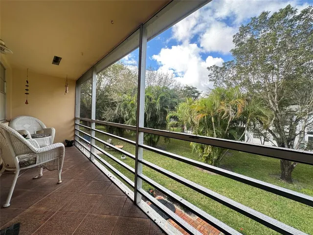 a view of a two chair in the balcony