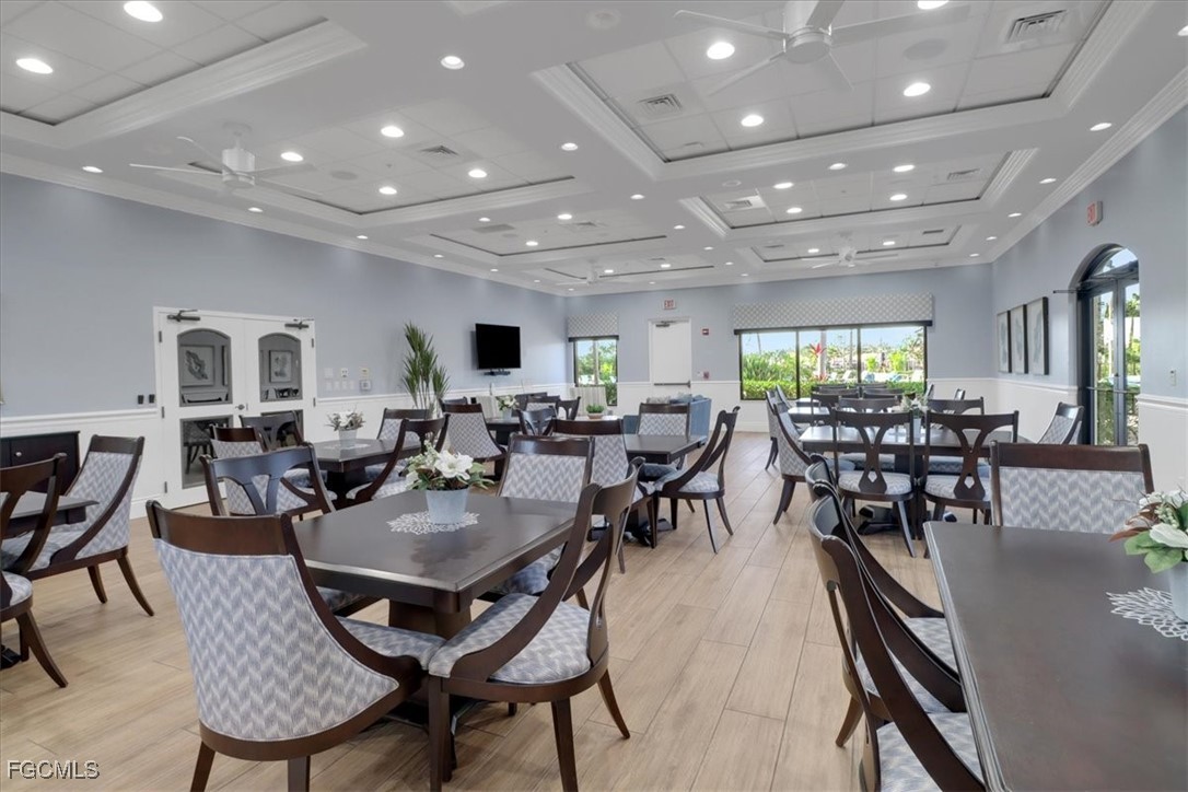 19674 Villa Rosa Loop Estero, FL 33967 - Photo 29 of 33 a view of a dining area with furniture