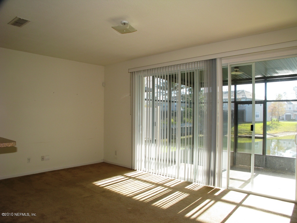 5880 Sandstone Way Jacksonville, FL 32258 - Photo 4 of 20 a view of a bedroom with a balcony