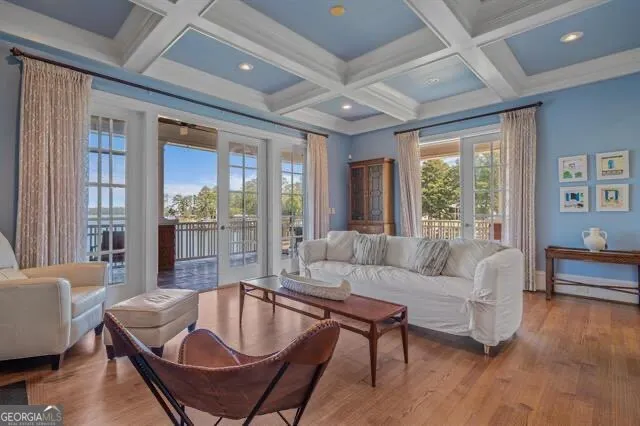 a kitchen with cabinets appliances a sink and a counter top space