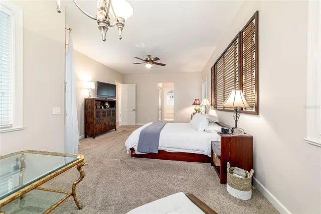a view of a swimming pool with a lounge chair