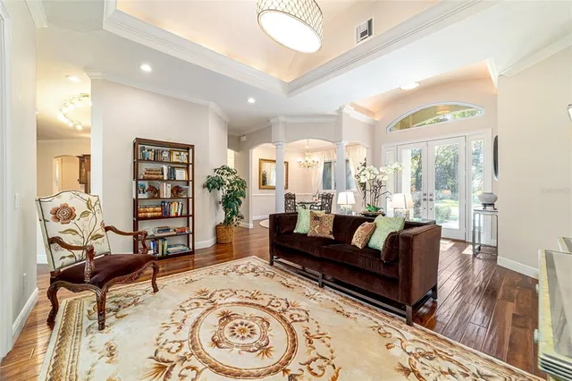 a large kitchen with a table and chairs