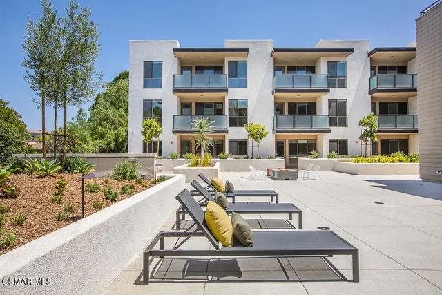 a view of an outdoor space with swimming pool