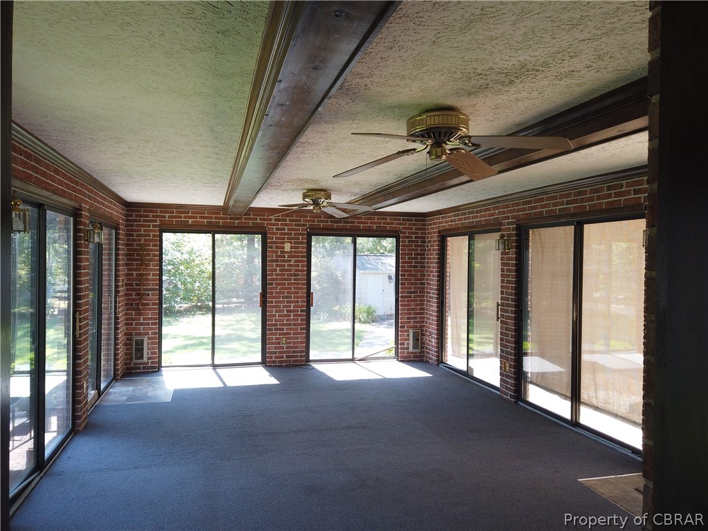230 Treva Road Sandston, VA 23150 - Photo 17 of 40 Bright sun room with beamed ceiling