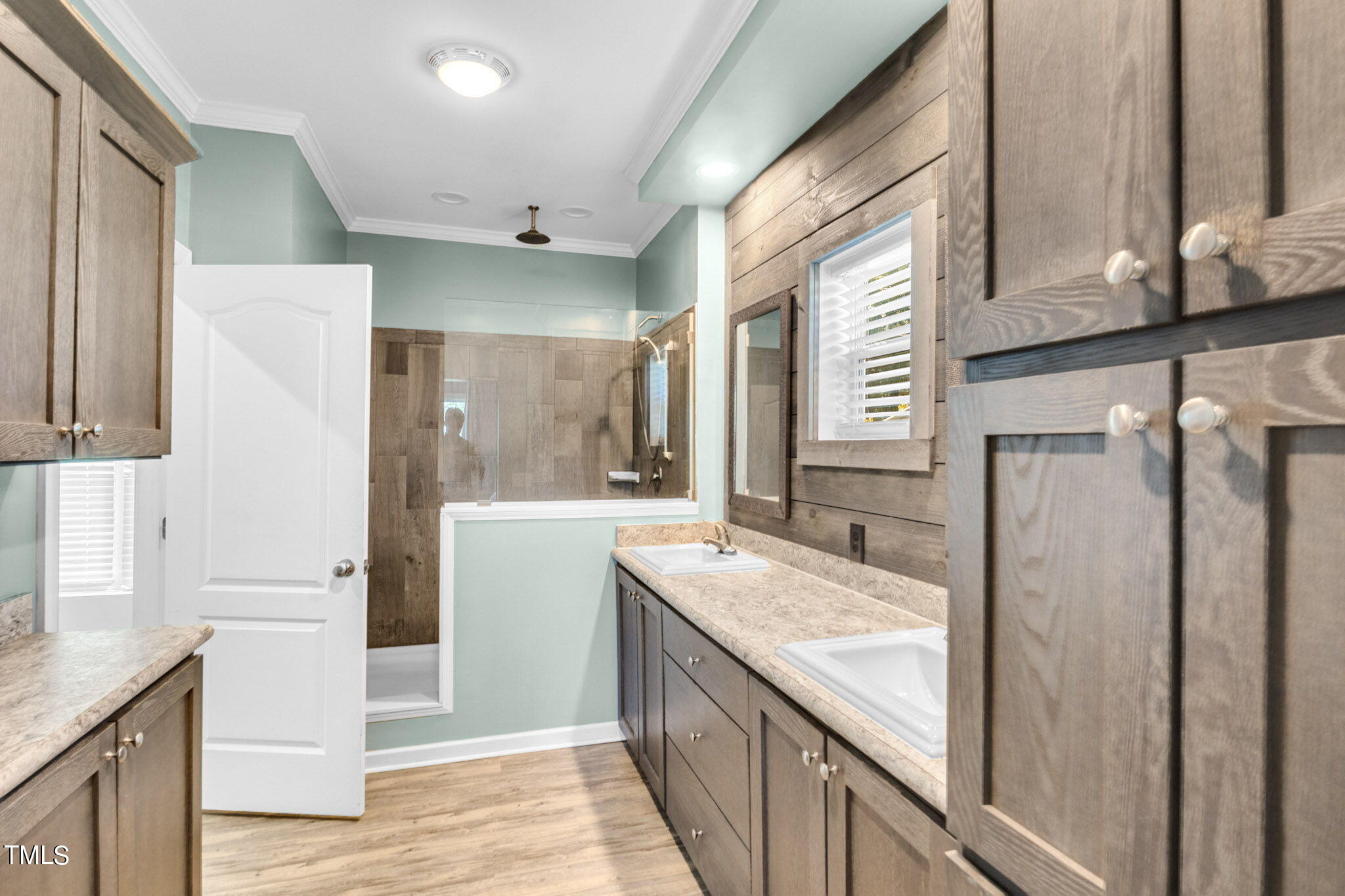 3218 Old N C 75 Stem, NC 27581 - Photo 20 of 35 a bathroom with a granite countertop sink and a mirror