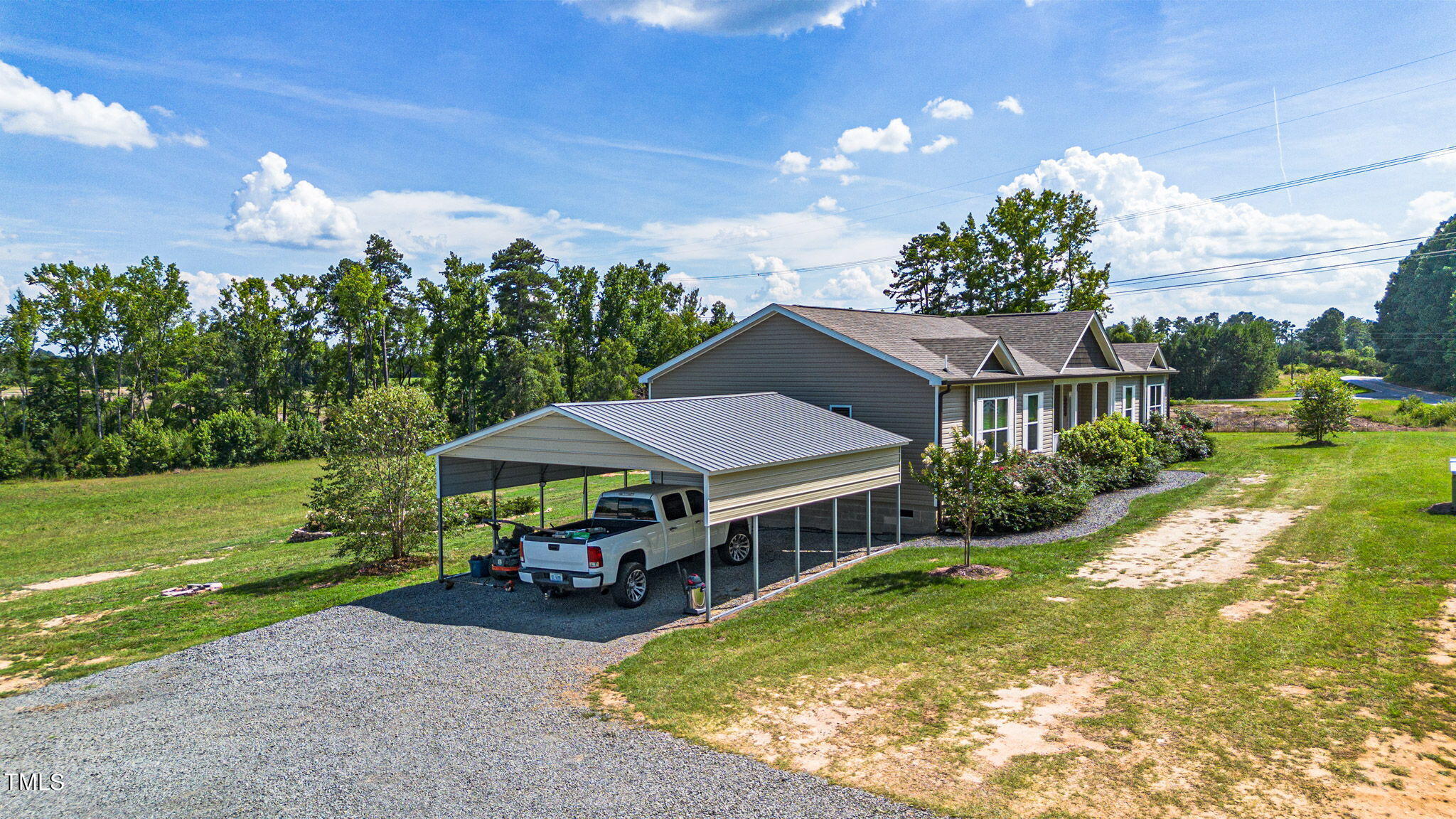 3218 Old N C 75 Stem, NC 27581 - Photo 2 of 35 a view of a house with a yard