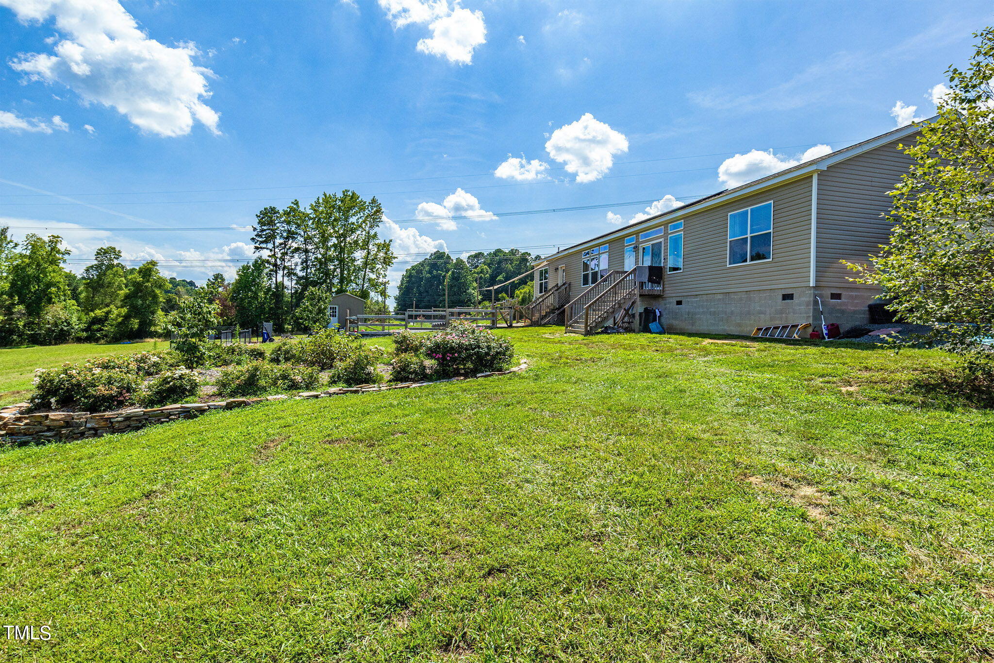 3218 Old N C 75 Stem, NC 27581 - Photo 34 of 35 a view of a house with a big yard