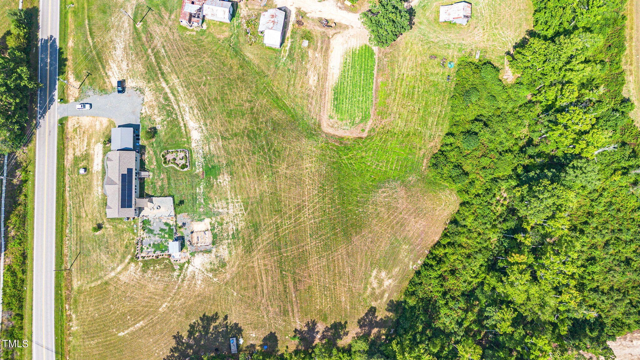 3218 Old N C 75 Stem, NC 27581 - Photo 7 of 35 a bathroom with a swimming pool table and chairs
